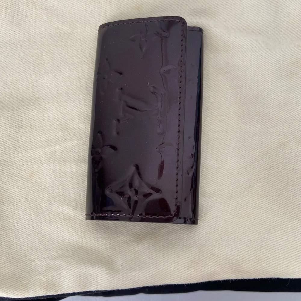 Authentic Louis Vuitton Vernis Key Holder in Deep Burgundy